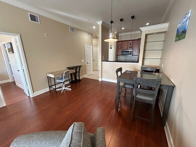 This inviting living space features warm wood floo
