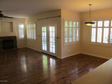 LOTS OF WINDOWS OVERLOOKING BACKYARD