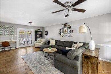 Living Room Opening to Sunroom