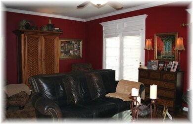 Door leads to the private back deck & yard.