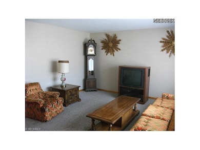 VERY SPACIOUS LIVING ROOM WITH NEWER CARPETING THROUGHOUT MOST OF THE FIRST FLOOR!