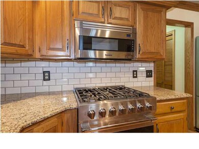 Viking Gas Range with built-in microwave.