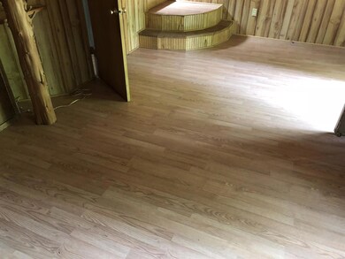 Laminate flooring on bottom level Living Room.