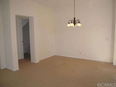 The dining area is adjacent to the kitchen and liv