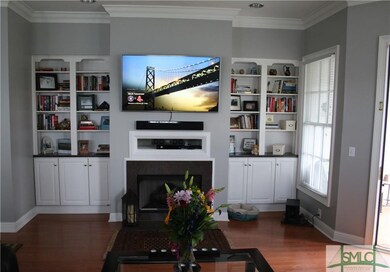 Great room fire place with built-ins.