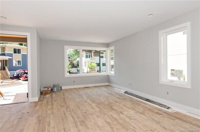 Bright Living Room with Inviting Entry