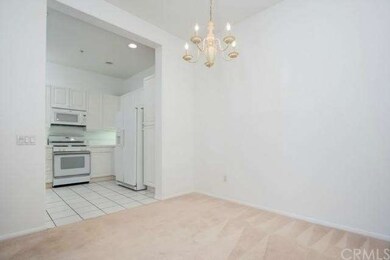 Separate dining room area conveniently located jus