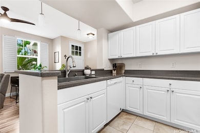 Kitchen is clean and functional with plenty of cou