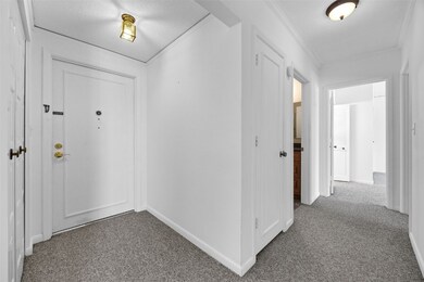 View from inside front entry.  Coat closet is on l