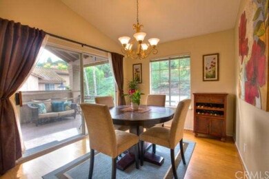 Dining Area Opens to Outdoor Patio with View of Ou