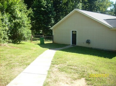 Side view of the Eargle home.  The third parking s