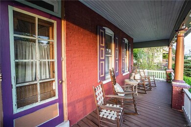The front porch is a great place to relax and rock with a glass of lemonade on a hot day!