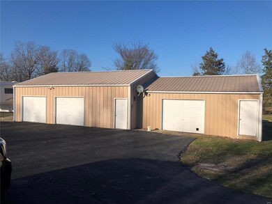 The 3 bay garage.  Other 2 are around back.