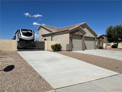 Ranch-style house featuring a garage