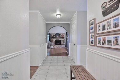 Hall with light hardwood / wood-style floors and c
