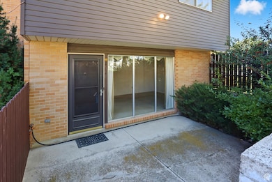 Front entrance to property with a patio area