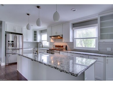 wow!! This kitchen is stunning!  Huge granite coun