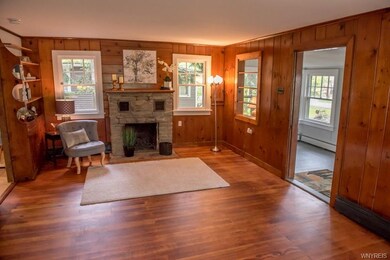 LOVELY LIVING ROOM WITH ROMANTIC FIREPLACE ! HARDW