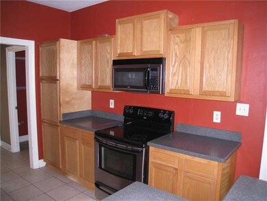 Kitchen. PRETTY OAK CABINETS AND BUILT-IN PANTRY