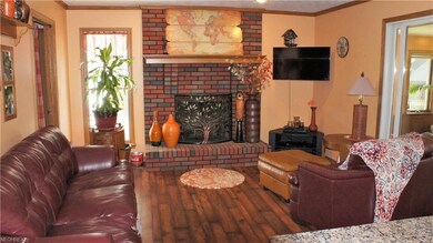 Family room, with fireplace, connects to 4 season 