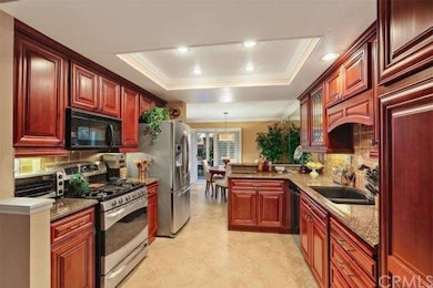 Upgraded Chef's Kitchen with Gorgeous Wood Cabinet