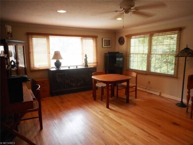 The dining room area is connected to the living ro