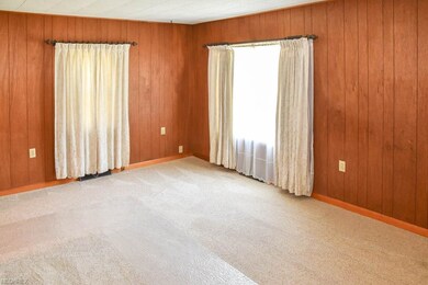 Living room with new carpet.