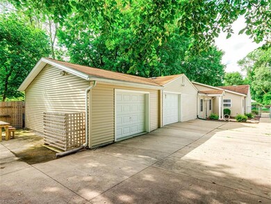 2 car garage with 3rd bay enclosed