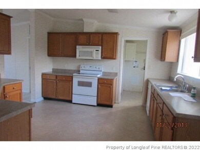 kitchen with range, dishwasher