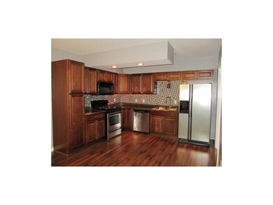 KITCHEN OFFERS AMPLE PANTRY & CABINETS