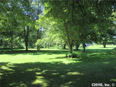 Exterior Front. Super yard with mature trees and l