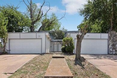 View of front of home featuring two garages