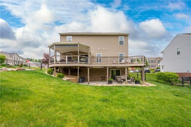 The back yard is amazing with multiple seating are
