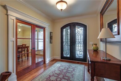 Custom front doors allow natural light in.