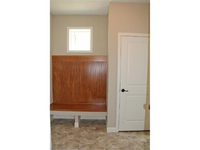 Back entry has a bench , coat closet and 1/2 bath.