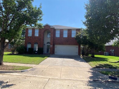 View of front of house featuring a garage, a front