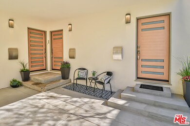 All three triplex unit front doors