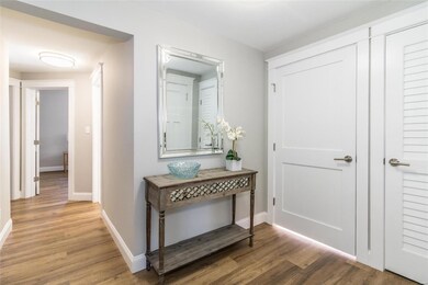 Entry foyer greets you with Luxury Vinyl Plank flo