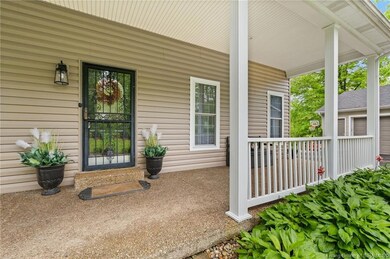 Enjoy the outdoors on the covered porch!