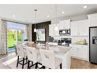 Dining area adjacent to the kitchen, with sliding 