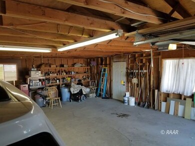INSIDE 3 CAR GARAGE