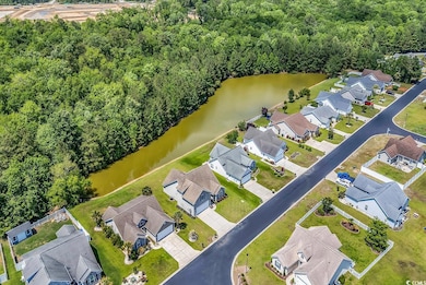 Drone / aerial view featuring a water view, a view