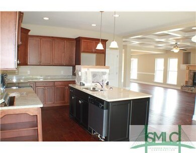 Kitchen. Kitchen is open to Great Room and is domi