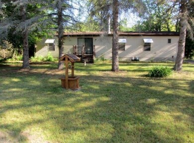 Side Facing Wooded Drive