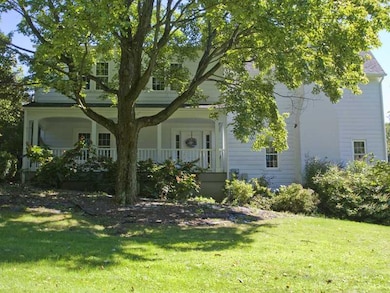 Exterior Front. What started as a modest farmhouse