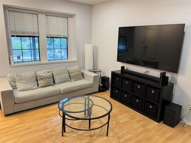 Living area featuring wood finished floors