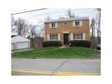 Exterior Front. Front of house and garage
