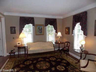 Living Room. Elegant Living Room with hardwood floors and lots of moldings.
