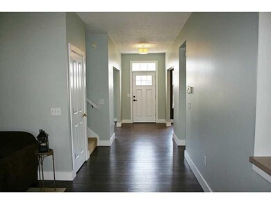 1st Floor Plan. Looking at the front door, living room, stairs, closet and family room on the left, dining room and kitchen on the right.