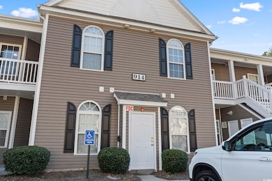 Townhome / multi-family property featuring a balco